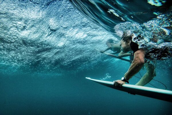 Surfer Underwater